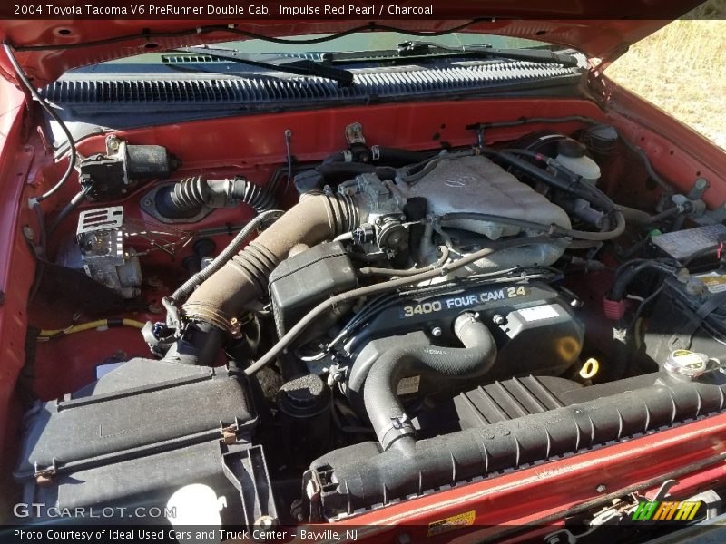 Impulse Red Pearl / Charcoal 2004 Toyota Tacoma V6 PreRunner Double Cab