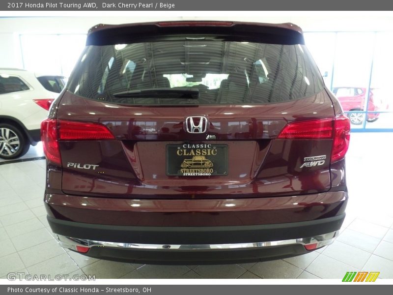 Dark Cherry Pearl / Beige 2017 Honda Pilot Touring AWD