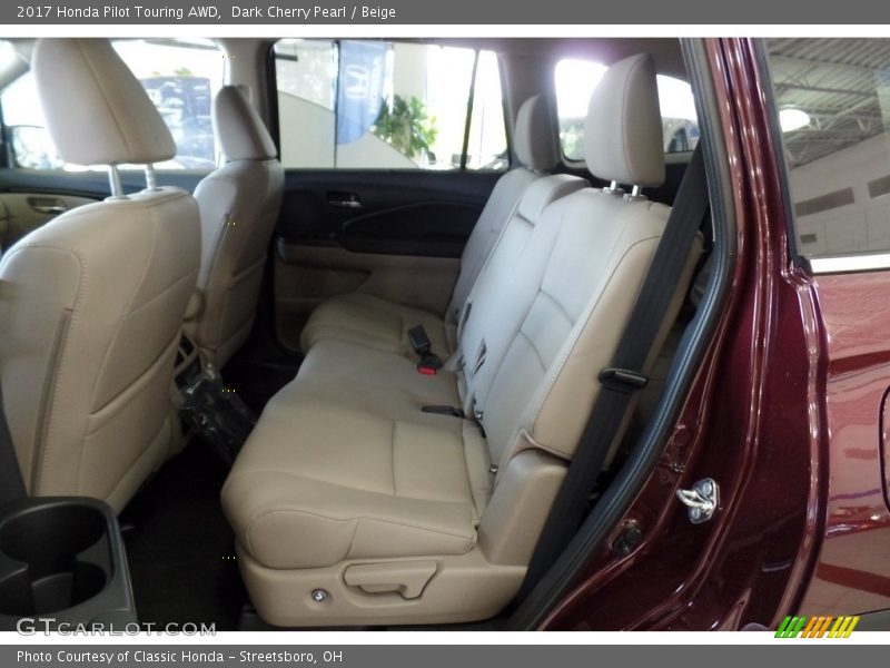 Dark Cherry Pearl / Beige 2017 Honda Pilot Touring AWD