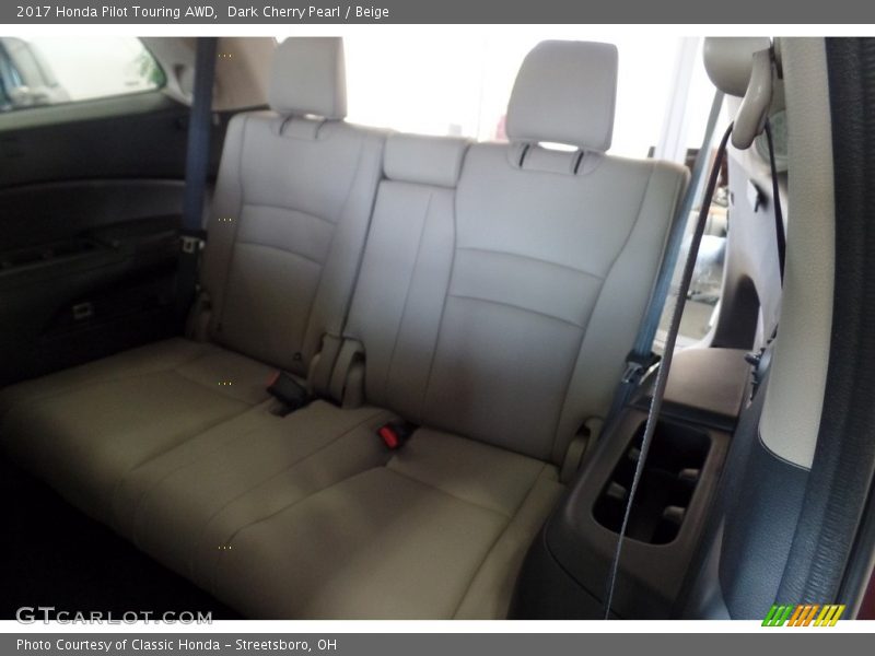 Dark Cherry Pearl / Beige 2017 Honda Pilot Touring AWD