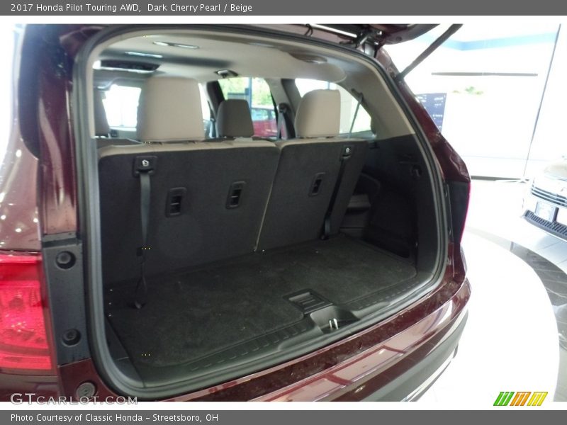 Dark Cherry Pearl / Beige 2017 Honda Pilot Touring AWD