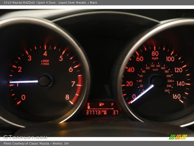 Liquid Silver Metallic / Black 2010 Mazda MAZDA3 i Sport 4 Door