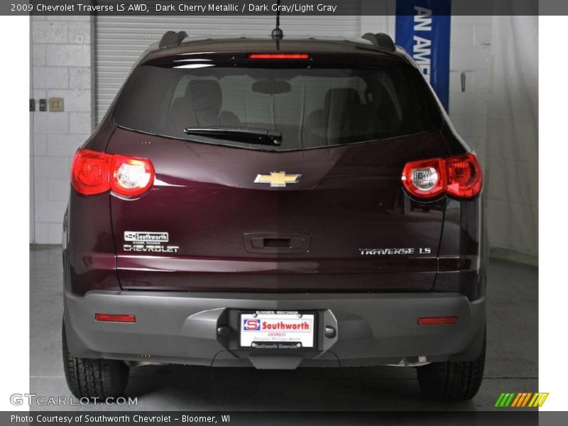 Dark Cherry Metallic / Dark Gray/Light Gray 2009 Chevrolet Traverse LS AWD