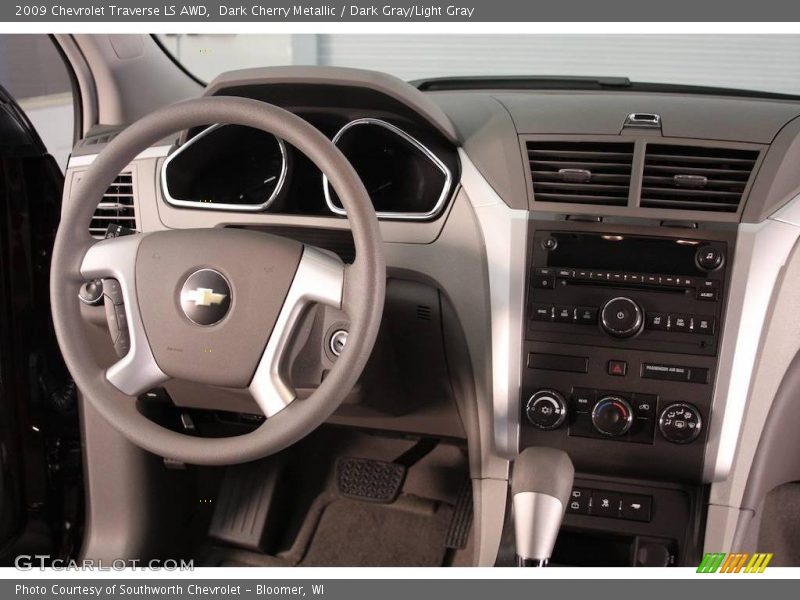 Dark Cherry Metallic / Dark Gray/Light Gray 2009 Chevrolet Traverse LS AWD