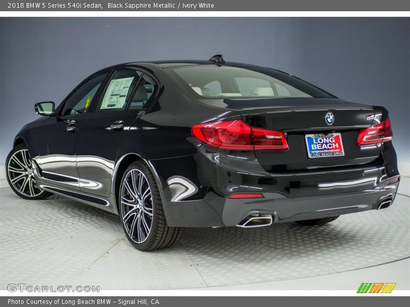 Black Sapphire Metallic / Ivory White 2018 BMW 5 Series 540i Sedan