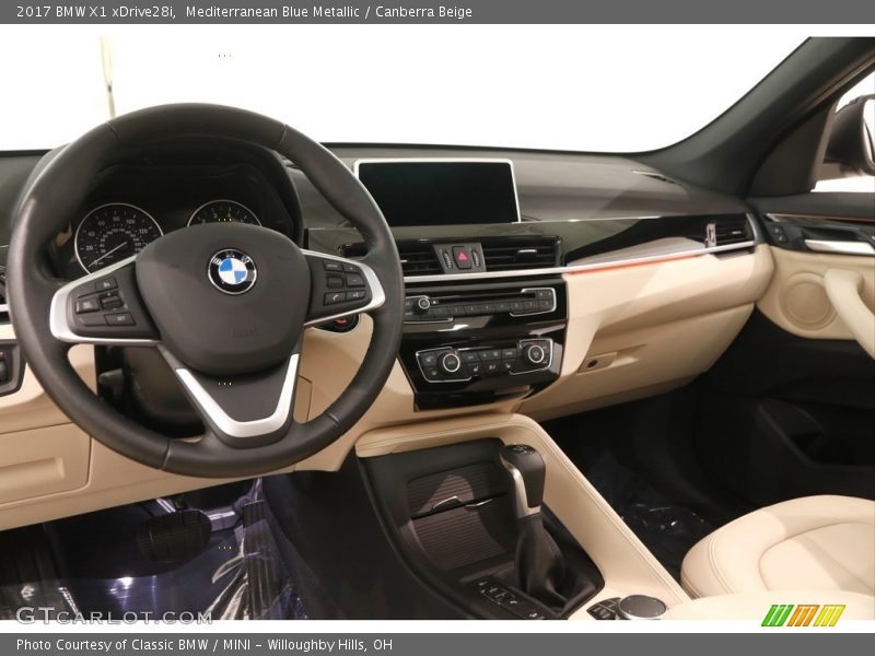 Mediterranean Blue Metallic / Canberra Beige 2017 BMW X1 xDrive28i