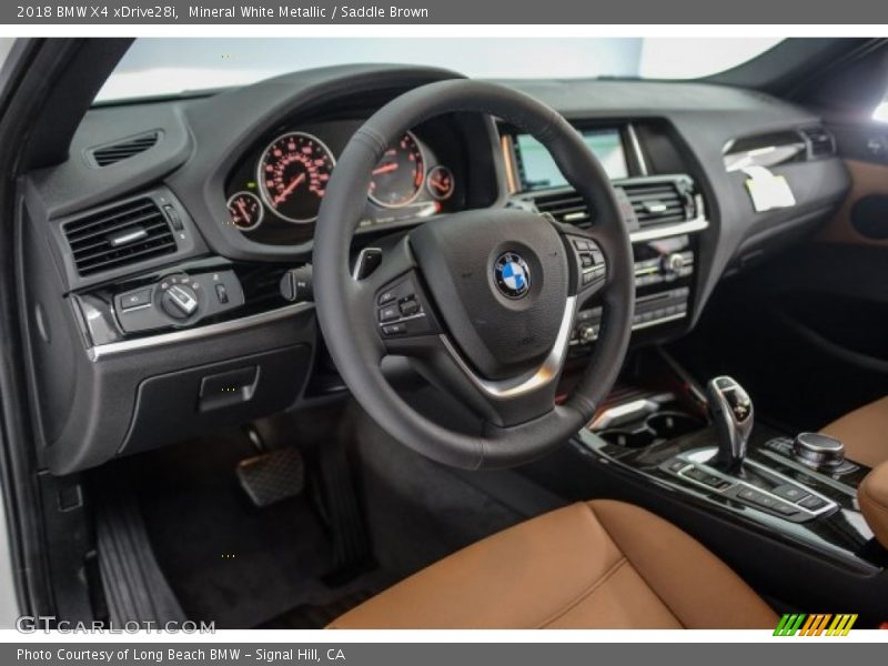 Mineral White Metallic / Saddle Brown 2018 BMW X4 xDrive28i