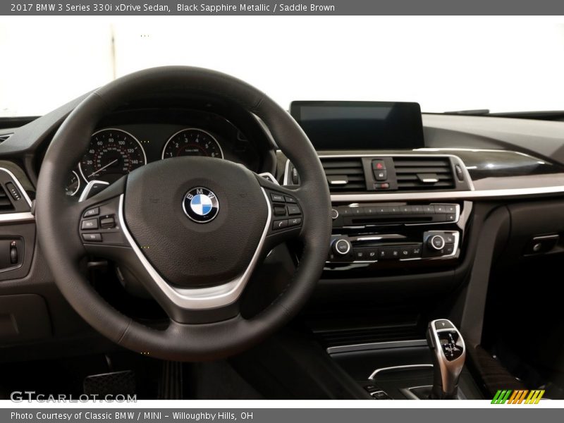 Black Sapphire Metallic / Saddle Brown 2017 BMW 3 Series 330i xDrive Sedan