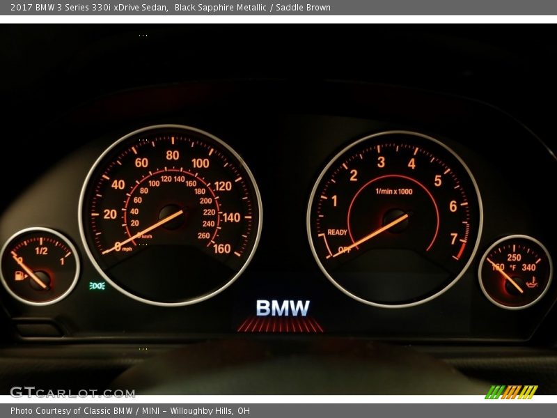 Black Sapphire Metallic / Saddle Brown 2017 BMW 3 Series 330i xDrive Sedan