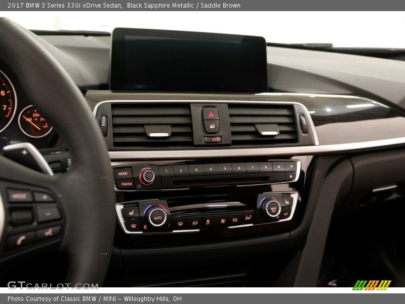 Black Sapphire Metallic / Saddle Brown 2017 BMW 3 Series 330i xDrive Sedan