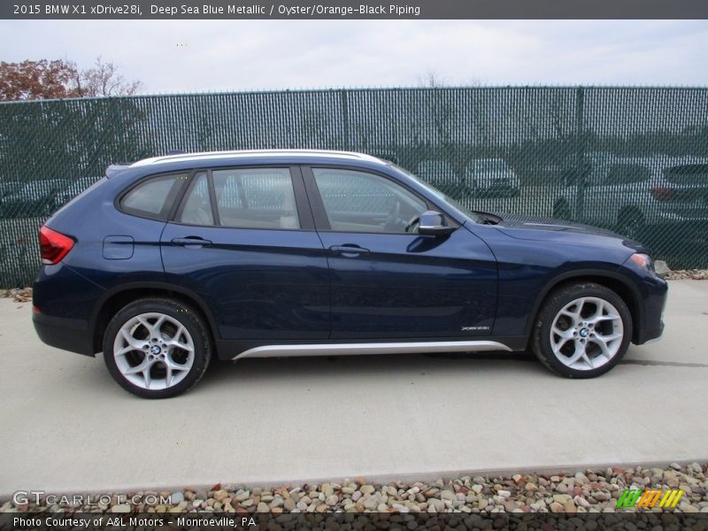 Deep Sea Blue Metallic / Oyster/Orange-Black Piping 2015 BMW X1 xDrive28i