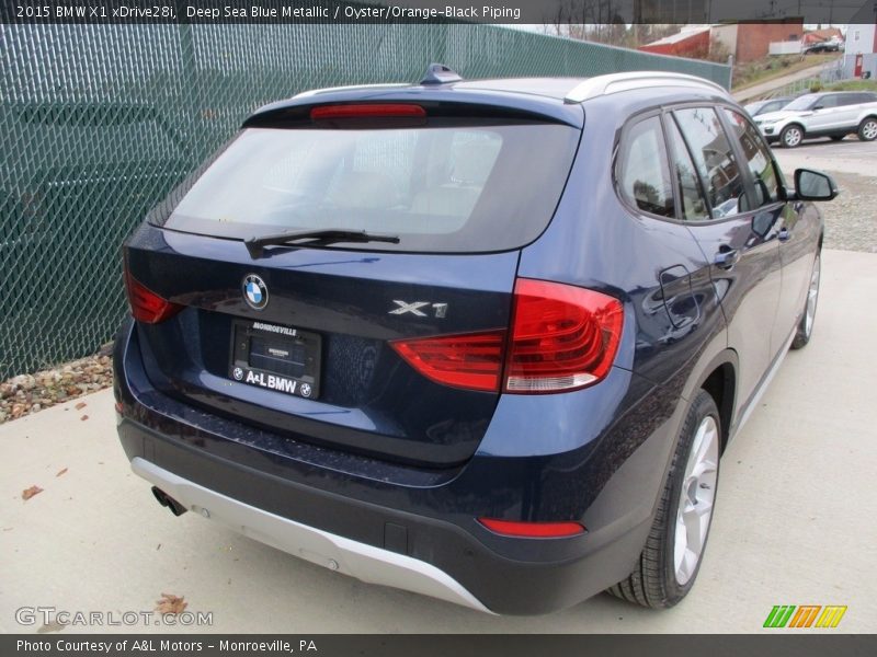 Deep Sea Blue Metallic / Oyster/Orange-Black Piping 2015 BMW X1 xDrive28i