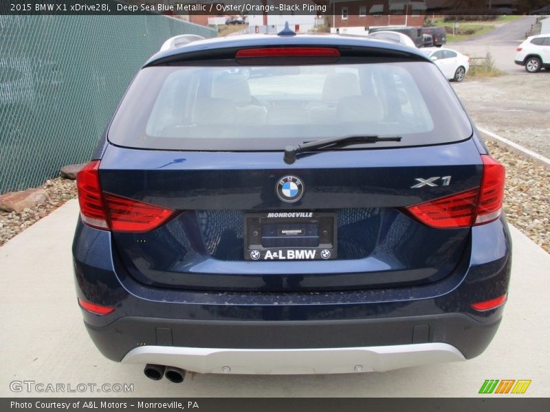 Deep Sea Blue Metallic / Oyster/Orange-Black Piping 2015 BMW X1 xDrive28i