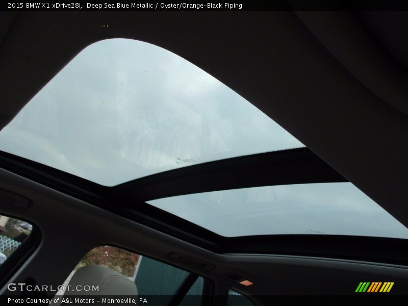 Deep Sea Blue Metallic / Oyster/Orange-Black Piping 2015 BMW X1 xDrive28i