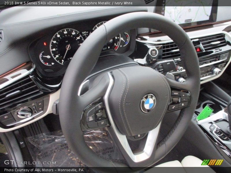 Black Sapphire Metallic / Ivory White 2018 BMW 5 Series 540i xDrive Sedan