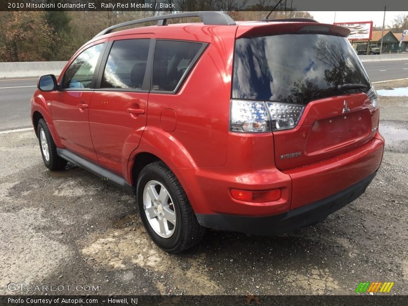 Rally Red Metallic / Black 2010 Mitsubishi Outlander ES