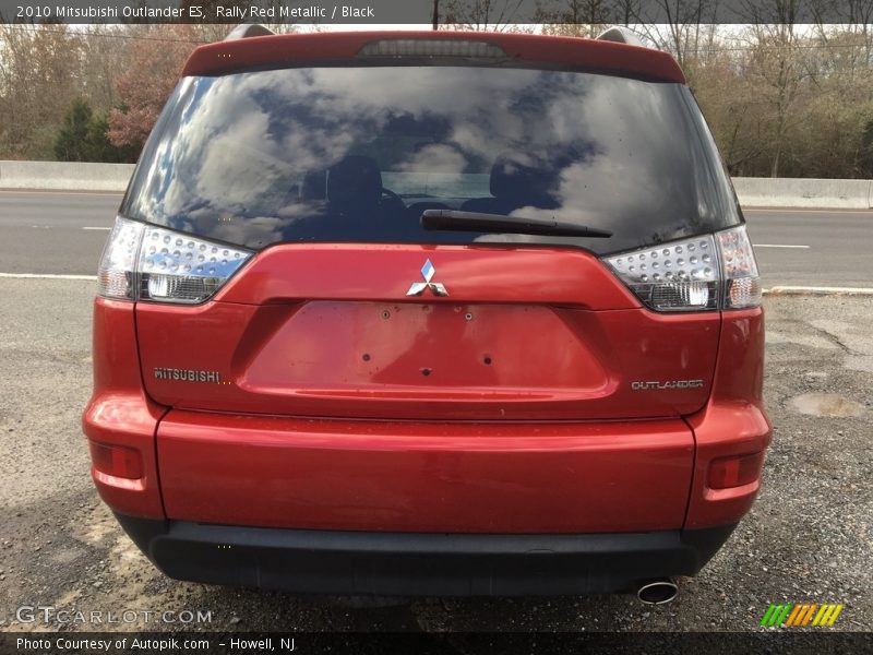 Rally Red Metallic / Black 2010 Mitsubishi Outlander ES