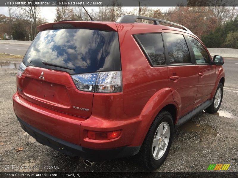 Rally Red Metallic / Black 2010 Mitsubishi Outlander ES
