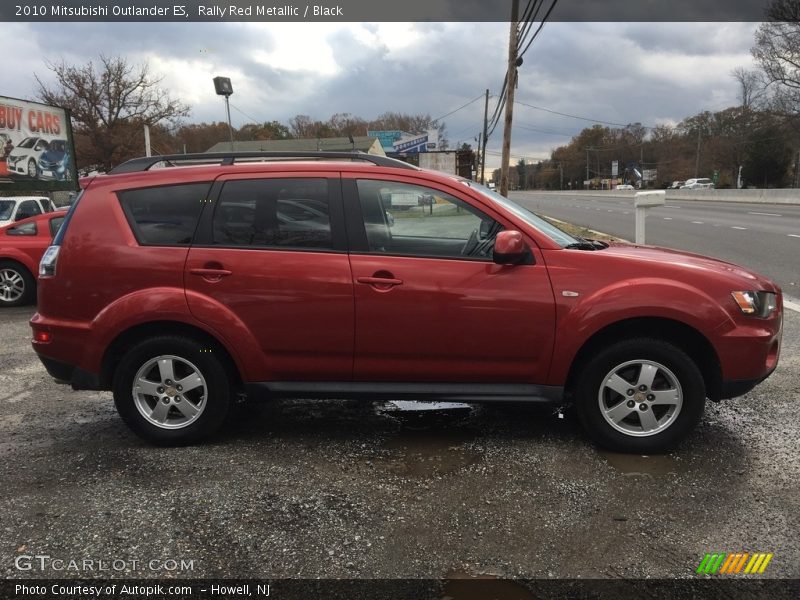 Rally Red Metallic / Black 2010 Mitsubishi Outlander ES