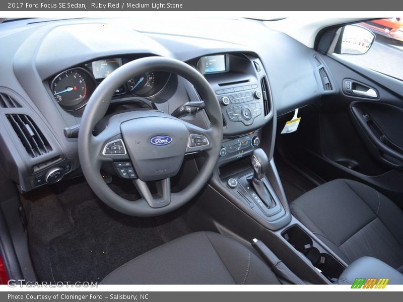 Ruby Red / Medium Light Stone 2017 Ford Focus SE Sedan