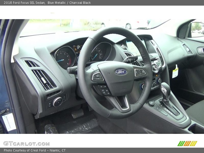 Blue Metallic / Charcoal Black 2018 Ford Focus SEL Sedan