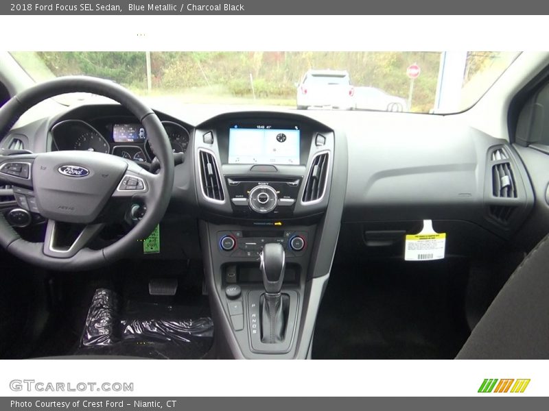 Blue Metallic / Charcoal Black 2018 Ford Focus SEL Sedan