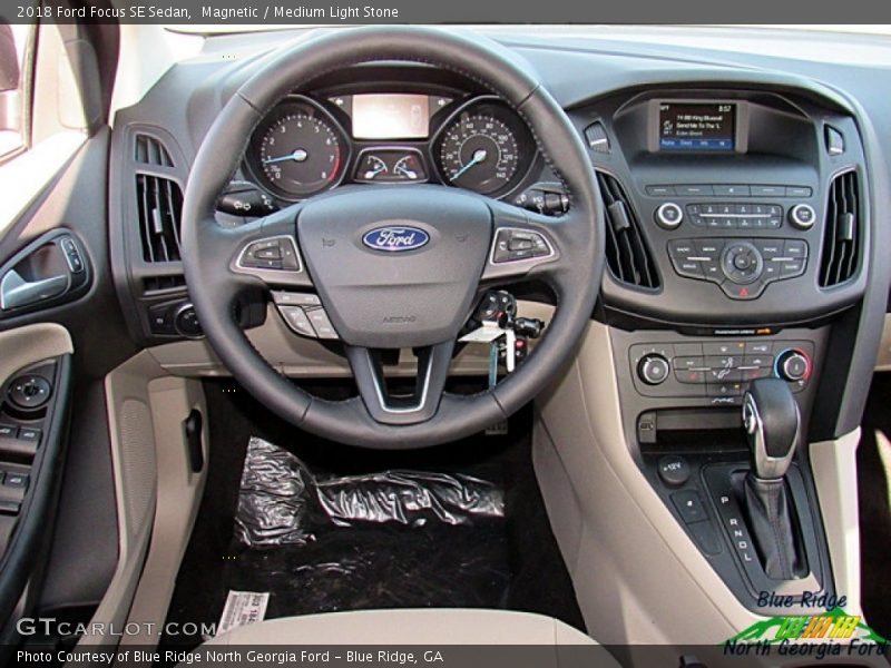 Magnetic / Medium Light Stone 2018 Ford Focus SE Sedan