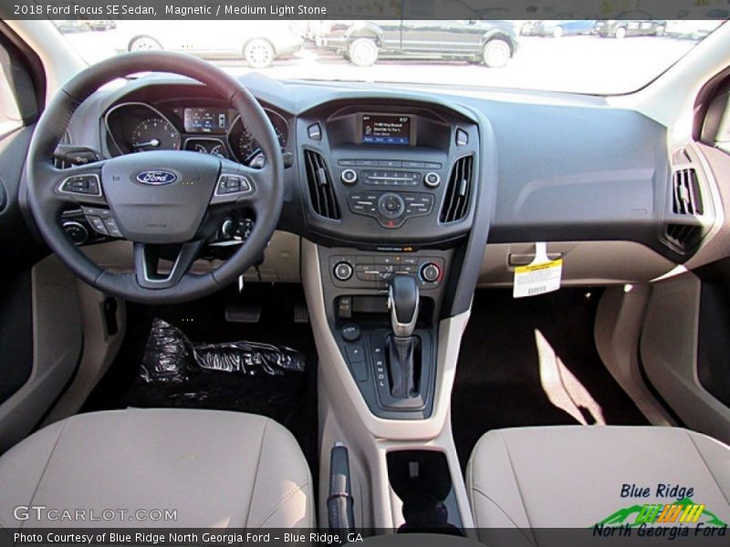 Magnetic / Medium Light Stone 2018 Ford Focus SE Sedan