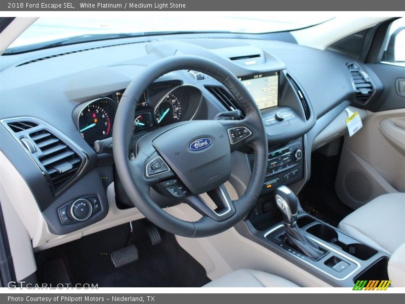 White Platinum / Medium Light Stone 2018 Ford Escape SEL