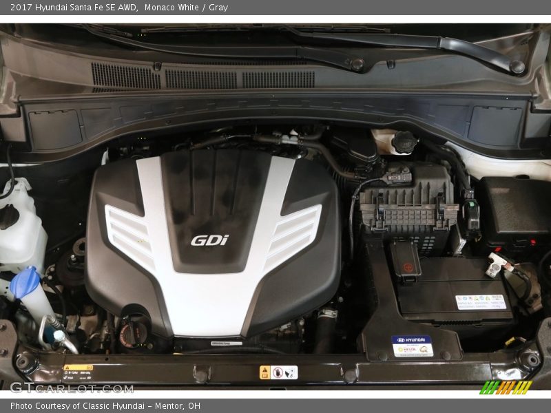 Monaco White / Gray 2017 Hyundai Santa Fe SE AWD