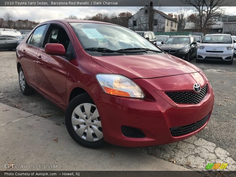 Barcelona Red Metallic / Dark Charcoal 2010 Toyota Yaris Sedan