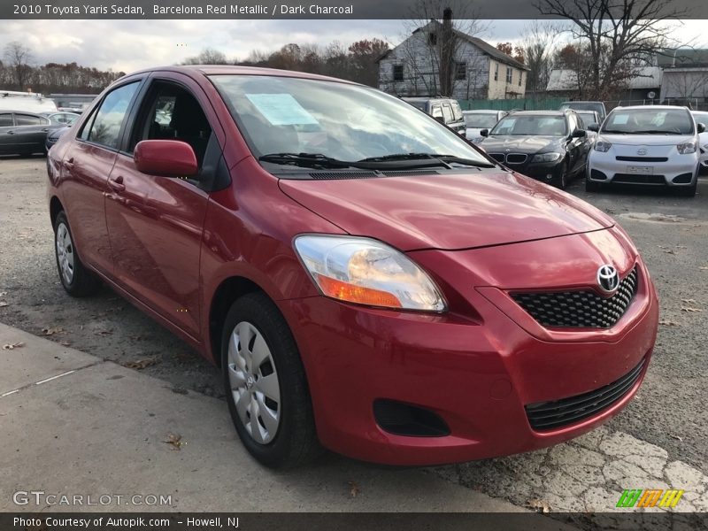 Barcelona Red Metallic / Dark Charcoal 2010 Toyota Yaris Sedan