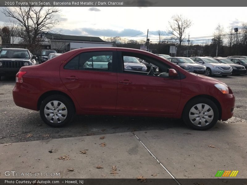 Barcelona Red Metallic / Dark Charcoal 2010 Toyota Yaris Sedan