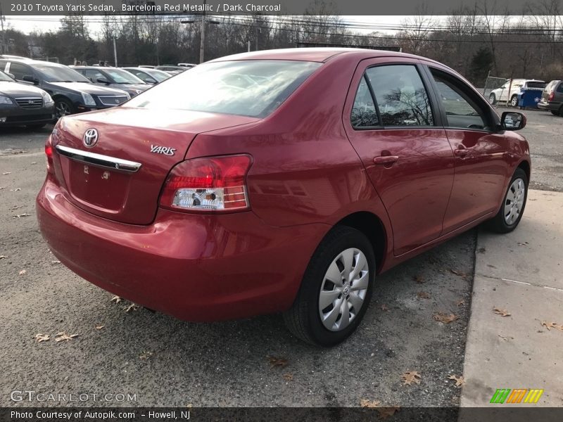 Barcelona Red Metallic / Dark Charcoal 2010 Toyota Yaris Sedan