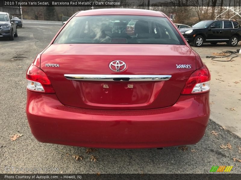 Barcelona Red Metallic / Dark Charcoal 2010 Toyota Yaris Sedan