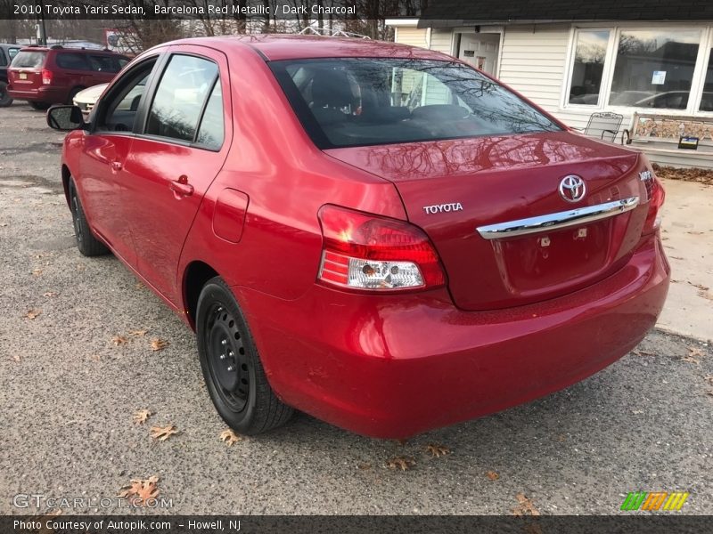 Barcelona Red Metallic / Dark Charcoal 2010 Toyota Yaris Sedan