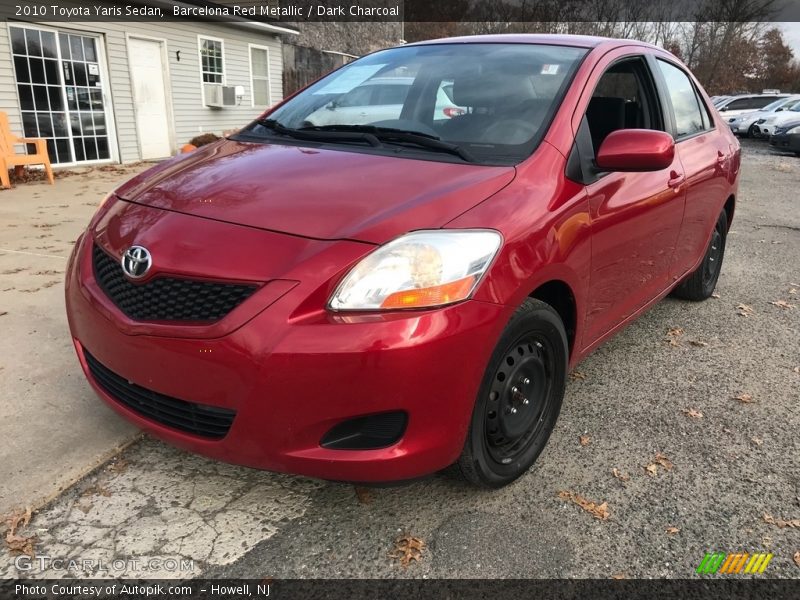 Barcelona Red Metallic / Dark Charcoal 2010 Toyota Yaris Sedan