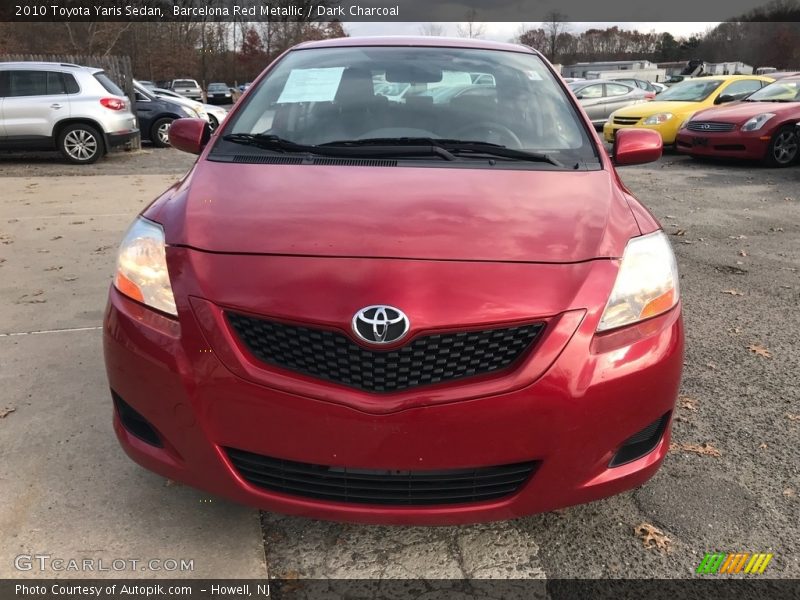Barcelona Red Metallic / Dark Charcoal 2010 Toyota Yaris Sedan