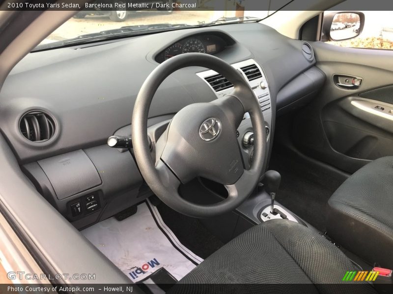 Barcelona Red Metallic / Dark Charcoal 2010 Toyota Yaris Sedan