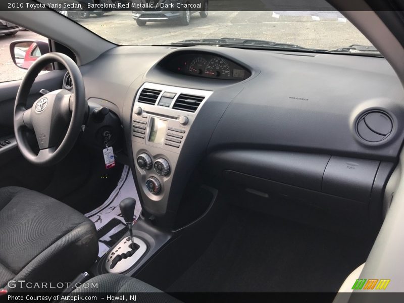 Barcelona Red Metallic / Dark Charcoal 2010 Toyota Yaris Sedan