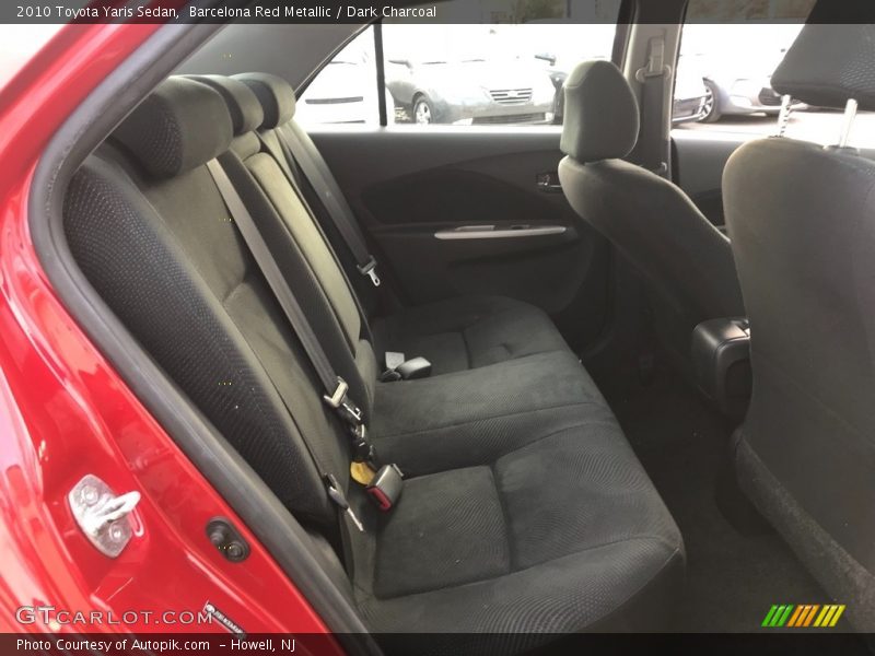 Barcelona Red Metallic / Dark Charcoal 2010 Toyota Yaris Sedan