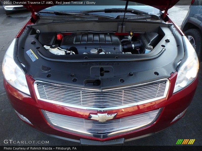 Red Jewel Tintcoat / Ebony 2010 Chevrolet Traverse LT AWD