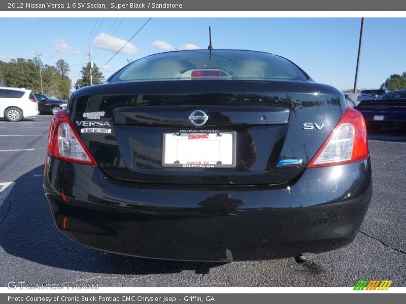 Super Black / Sandstone 2012 Nissan Versa 1.6 SV Sedan