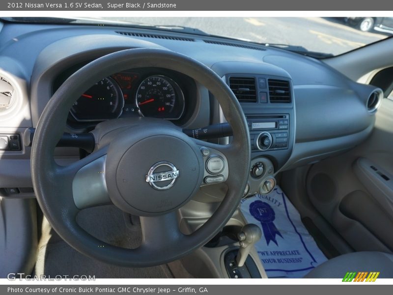 Super Black / Sandstone 2012 Nissan Versa 1.6 SV Sedan