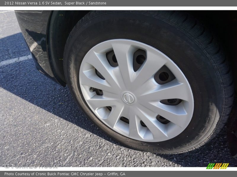 Super Black / Sandstone 2012 Nissan Versa 1.6 SV Sedan
