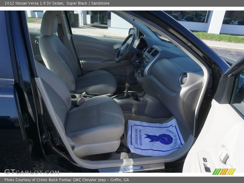 Super Black / Sandstone 2012 Nissan Versa 1.6 SV Sedan