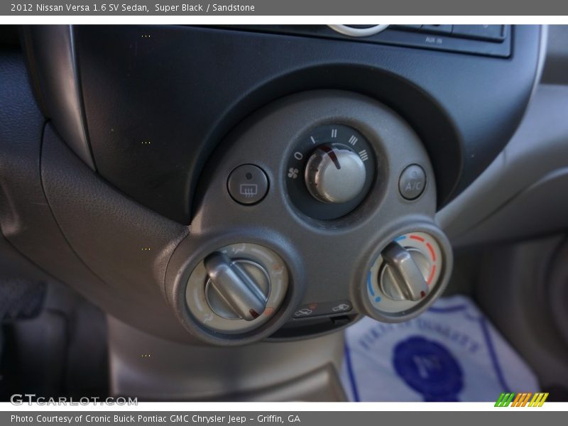 Super Black / Sandstone 2012 Nissan Versa 1.6 SV Sedan