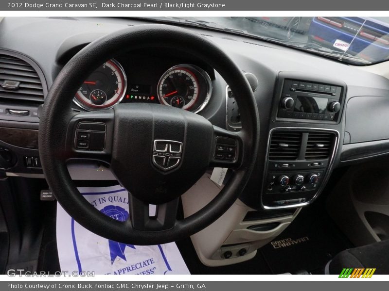 Dark Charcoal Pearl / Black/Light Graystone 2012 Dodge Grand Caravan SE