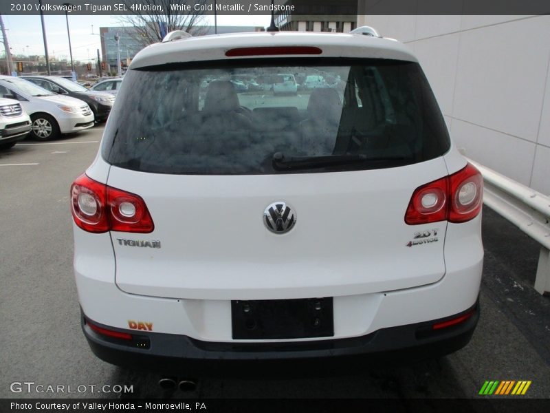 White Gold Metallic / Sandstone 2010 Volkswagen Tiguan SEL 4Motion