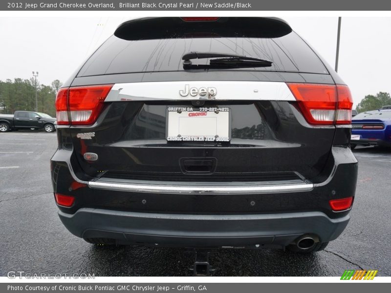 Brilliant Black Crystal Pearl / New Saddle/Black 2012 Jeep Grand Cherokee Overland